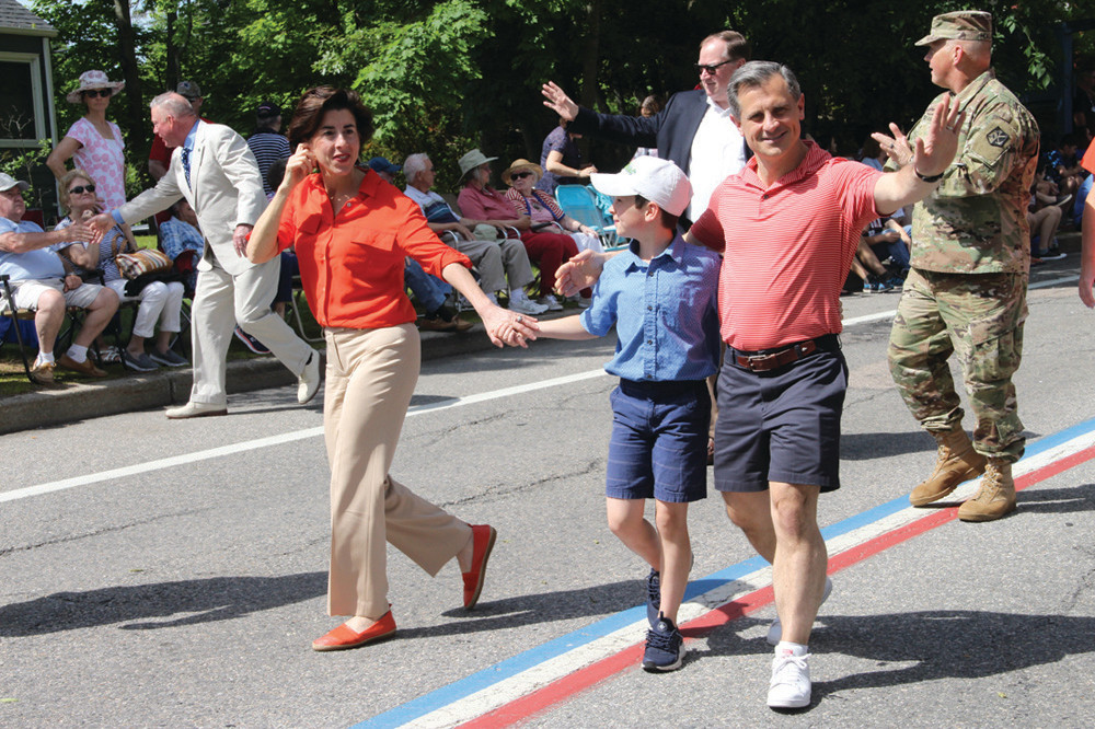 FIRST FAMILY: Governor Gina Raimondo and her family left the line of march on numerous occasions to acknowledge and shake the hands of spectators.